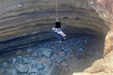 man rescued from cliff hole